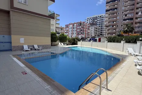3-комнатная квартира в Аланье, махалле Махмутлар, ул. Ататюрк, 131B