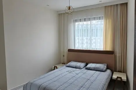 2-комнатная квартира в Аланье, махалле Махмутлар, ул. Ататюрк, 241B